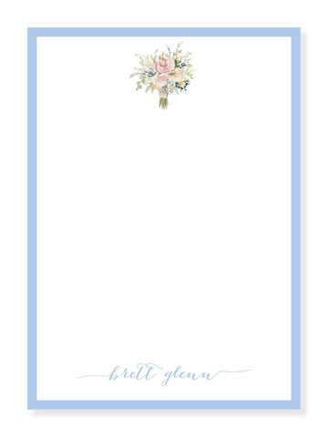 Bouquet and Blue Notepad